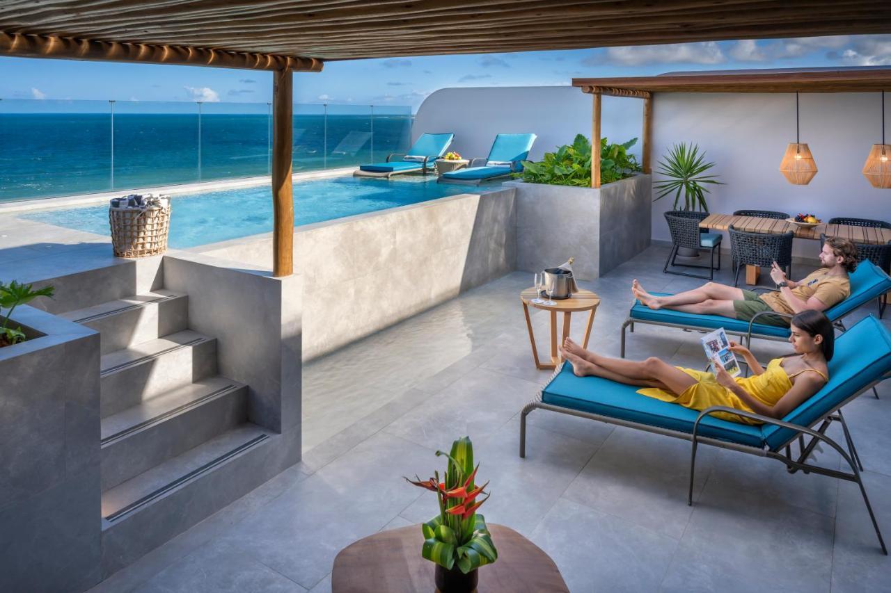 Serhs Natal Grand Hotel & Resort Экстерьер фото Rooftop pool at the hotel