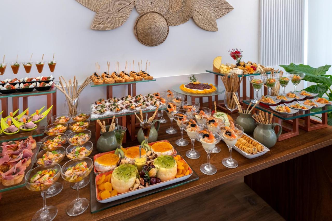 Serhs Natal Grand Hotel & Resort Экстерьер фото A buffet of tapas